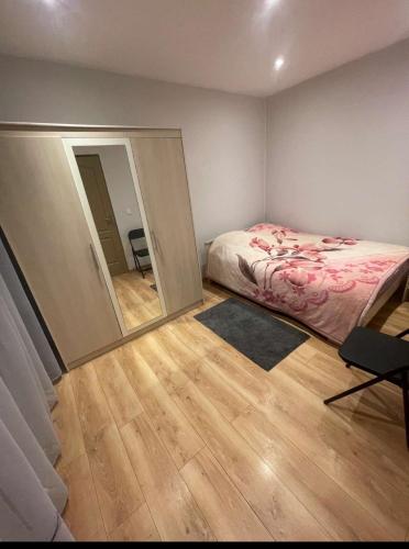 Katil atau katil-katil dalam bilik di Maison deux chambres