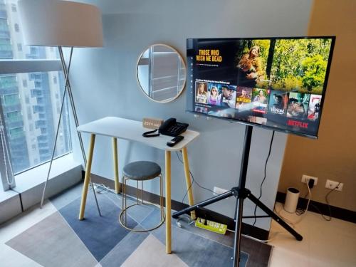 Televisyen dan/atau pusat hiburan di Uptown Parksuites Tower 1 BGC