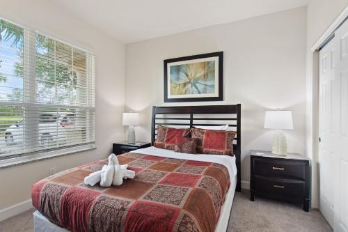 Postel nebo postele na pokoji v ubytování Priceless Peace At Serenity By Shine Villas 081