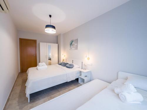Ένα ή περισσότερα κρεβάτια σε δωμάτιο στο Lloret apartment & parking
