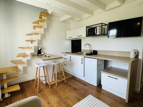Η κουζίνα ή μικρή κουζίνα στο Le Piccolo - Appartement Cosy - Wifi