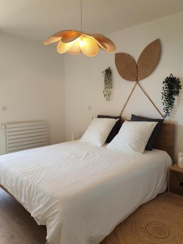 Postel nebo postele na pokoji v ubytování Appartement T2 à 3min de la plage