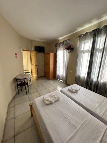 Postel nebo postele na pokoji v ubytování Eleganz Residence