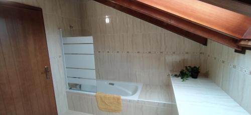 a bathroom with a sink and a toilet at Precioso duplex en Moncalvillo Green Golf in Sojuela