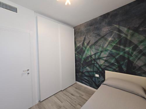Katil atau katil-katil dalam bilik di Home23Jesolo! Beach, Parking and Bikes included