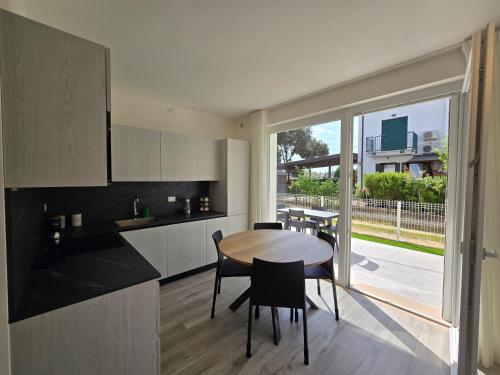 Kuchyň nebo kuchyňský kout v ubytování Home23Jesolo! Beach, Parking and Bikes included