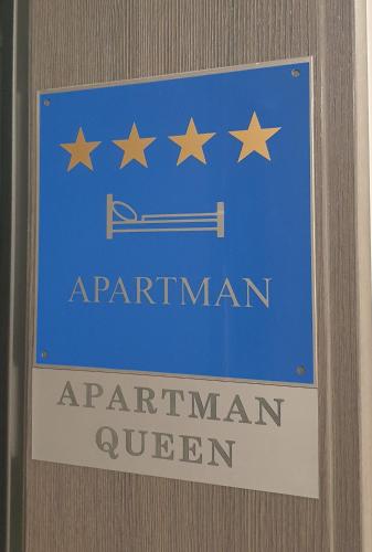 a blue sign with stars on a wall at Apartment Queen, self check-in, free private garage parking in Karlovac