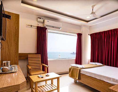 Postel nebo postele na pokoji v ubytování Hotel Sea Land