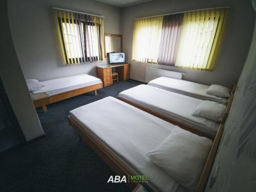 Postel nebo postele na pokoji v ubytování Garni Motel Aba