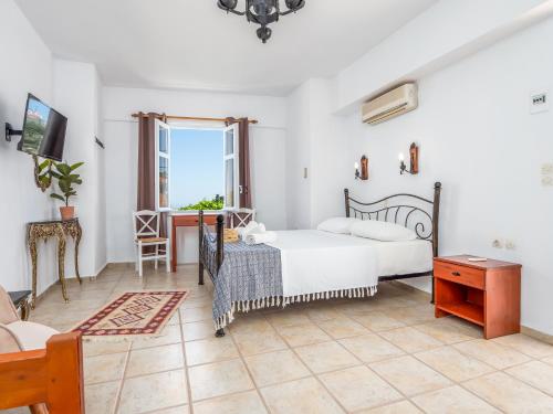 Ένα ή περισσότερα κρεβάτια σε δωμάτιο στο Lappa Apartments