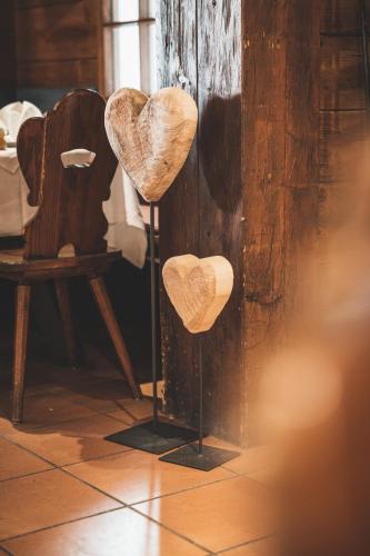 a couple of hearts on display in a room at S P O R T A L M - Seefeld in Seefeld in Tirol