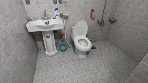 Un baño de One Stop Gb