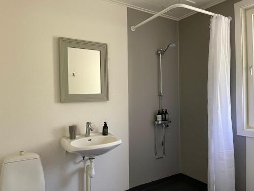 Koupelna v ubytování ÁILU - Arctic Hotel Apartments