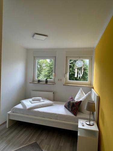 Ένα ή περισσότερα κρεβάτια σε δωμάτιο στο Apartment Kornbergblick