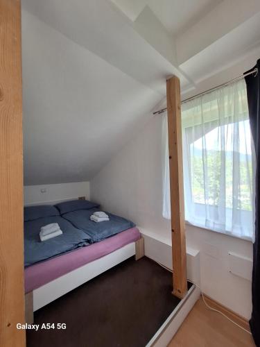 Postel nebo postele na pokoji v ubytování AlpenKlub Hotel