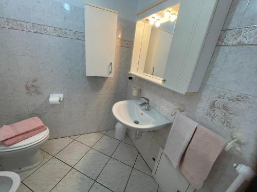 Koupelna v ubytování Casa Luca