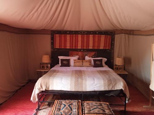 Llit o llits en una habitació de Night Desert Camp