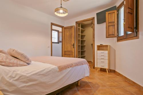 Postel nebo postele na pokoji v ubytování Casa Cuatro Vientos