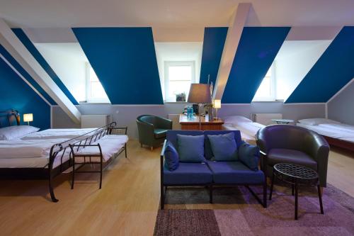 Katil atau katil-katil dalam bilik di TRIP INN PostHotel Düren