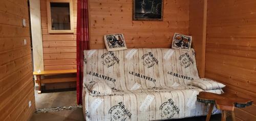 En eller flere senge i et værelse på Appartement fonctionnel