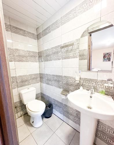 a bathroom with a toilet and a sink at Tevra Hotel, Top of the Mountain, Camping, Nature, Ijevan, Dilijan in Ijevan