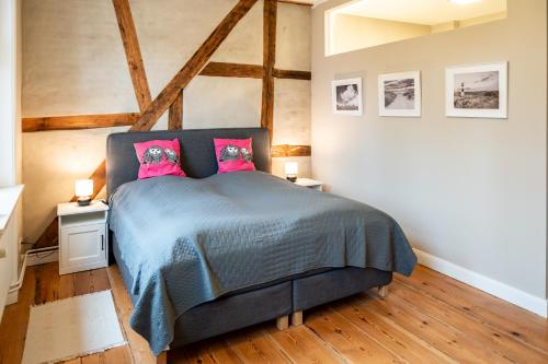 Llit o llits en una habitació de Ferienwohnung Dom