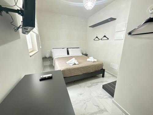 Ένα ή περισσότερα κρεβάτια σε δωμάτιο στο Casa MarFe