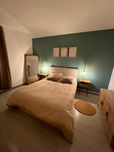 Ένα ή περισσότερα κρεβάτια σε δωμάτιο στο Superbe appartement