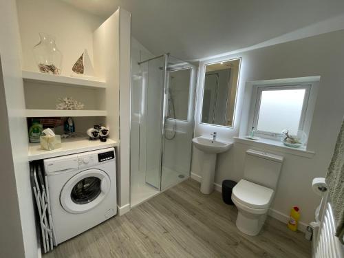 Koupelna v ubytování Rha Ha Cottage