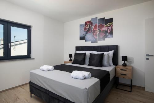 Cama ou camas em um quarto em Vila twins