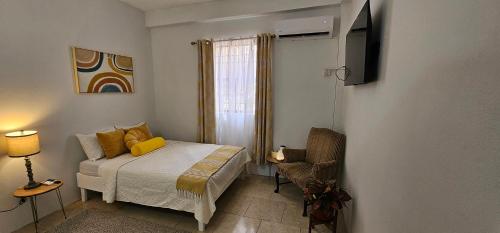 Ein Bett oder Betten in einem Zimmer der Unterkunft Kaye Sace Terrace