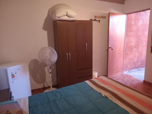 Voodi või voodid majutusasutuse Hostal Open House toas