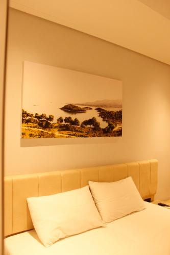 Postel nebo postele na pokoji v ubytování Bebi Hotel And Apartments