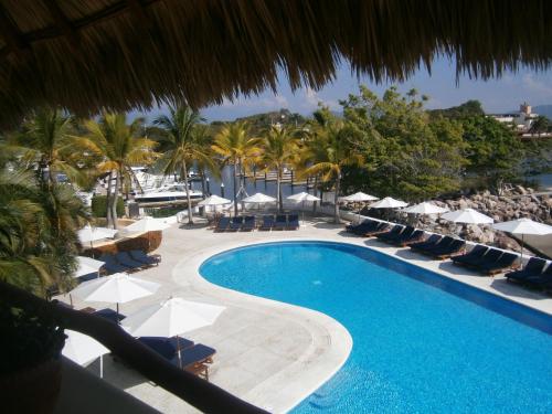 Πισίνα στο ή κοντά στο Villa Marina Porto Ixtapa in the Private Yacht Club