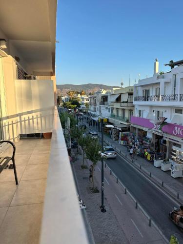 a view of a city street from a balcony at The Heidi's Central House in Kos Town
