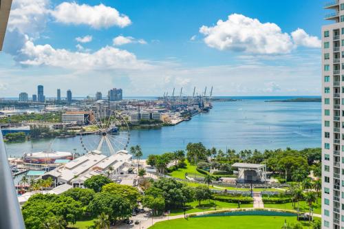 a view of the singapore river and a city at Breezy Stays Luxury Residences - near Kaseya Center in Miami