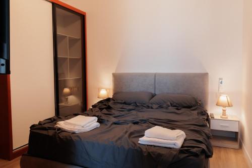 Llit o llits en una habitació de Beachfront Home