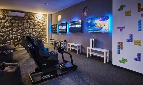a room with a gym with a rock wall at Magal Maradiso Hotel by Aminess in Njivice