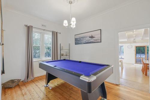 a living room with a pool table in it at Cape Hays in Cape Woolamai