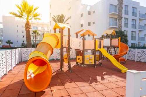 a playground at a resort with a slide at Papantonia Hotel in Protaras