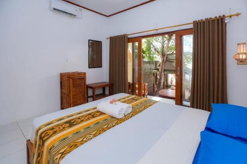 Katil atau katil-katil dalam bilik di Radika House
