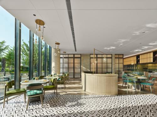 Χώρος καθιστικού στο Doubletree By Hilton Yantai Golden Coast Hotel & Suites