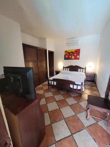 TV a/nebo společenská místnost v ubytování Hotel Valeria