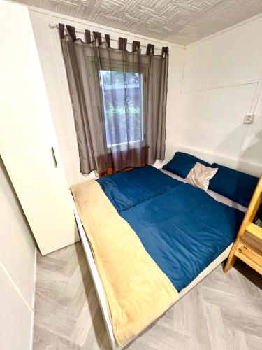 Postel nebo postele na pokoji v ubytování Chatky na Rozkoši - Radek