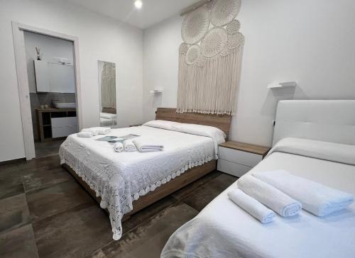 Postel nebo postele na pokoji v ubytování B&B Hakuna Matata