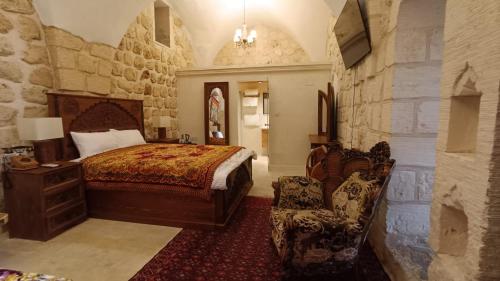 Katil atau katil-katil dalam bilik di Hercai Butik Otel