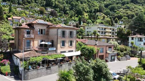 an aerial view of a building in a town at Arbostora Charme Hotel in Morcote