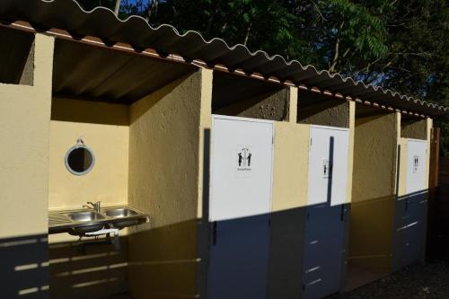 a building with a bathroom with a sink in it at La Cabane de Mercone GORIA in Corte