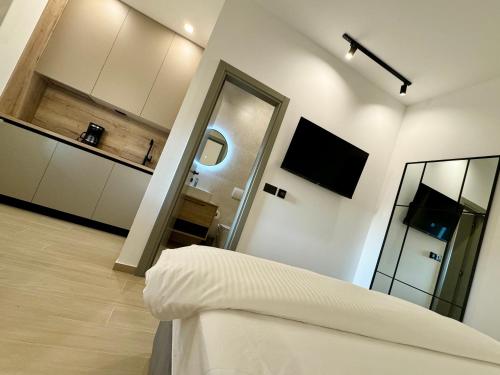 TV a/nebo společenská místnost v ubytování LUX Apartments