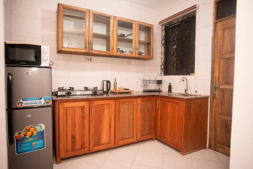 Kuchyň nebo kuchyňský kout v ubytování Domin Apartments